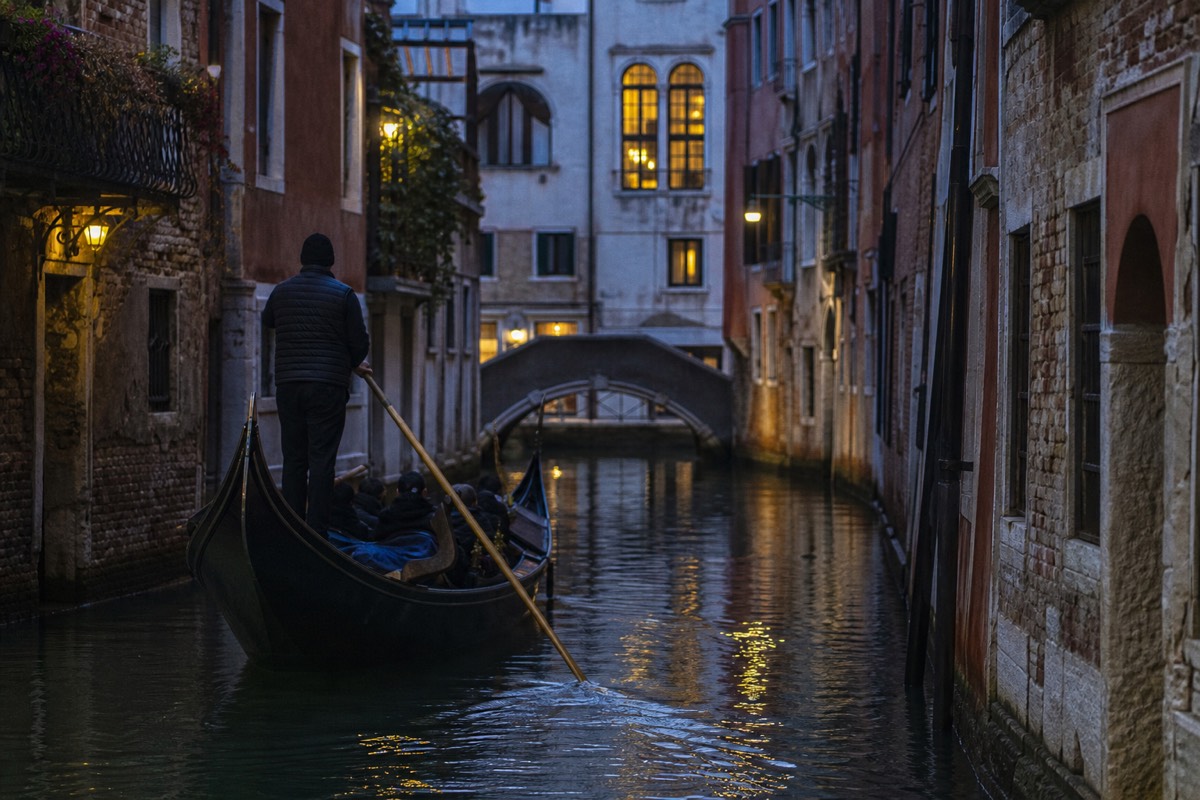 Private gondola gliding through a quiet side canal in Venice